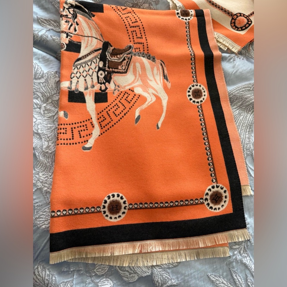 Hermès equestrian motif scarf,  featuring a prominent horse design cashmere